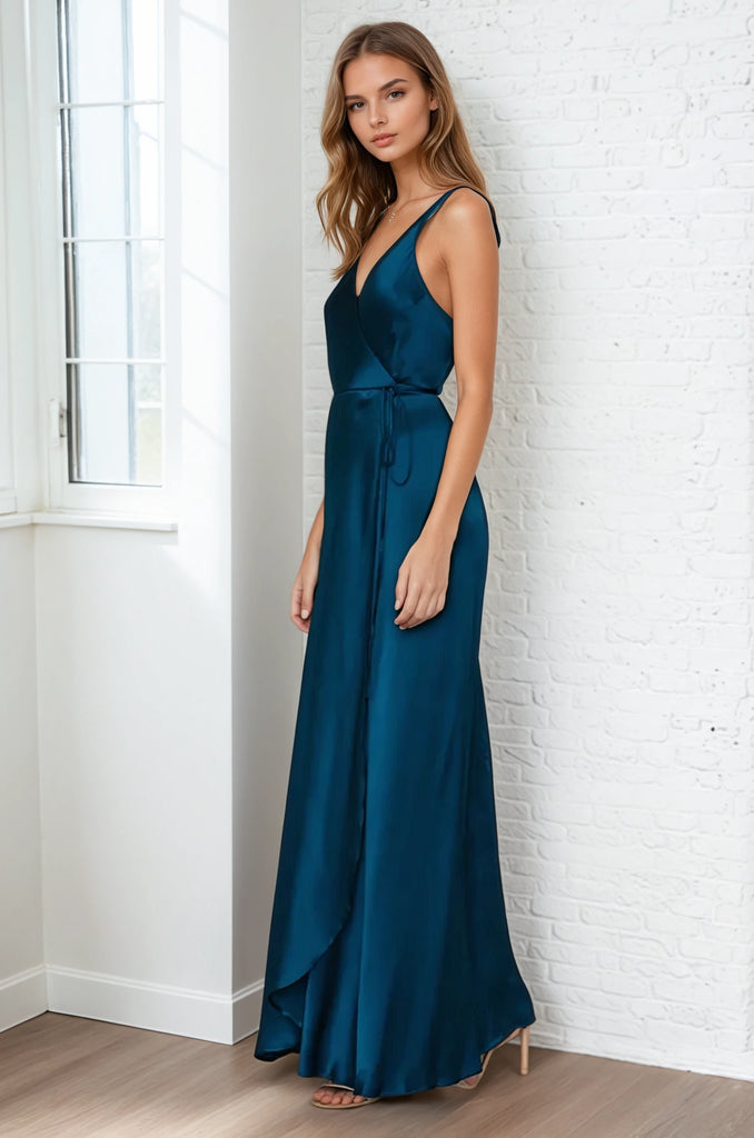 Yumi Kim's flowing Rush Hour Silk Satin Maxi Dress is your new go-to from weddings to running around the city. The wrap maxi dress includes a crossover bodice with deep v-neckline.