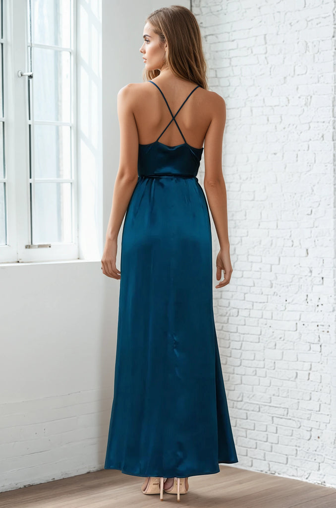 Yumi Kim's flowing Rush Hour Silk Satin Maxi Dress is your new go-to from weddings to running around the city. The wrap maxi dress includes a crossover bodice with deep v-neckline.