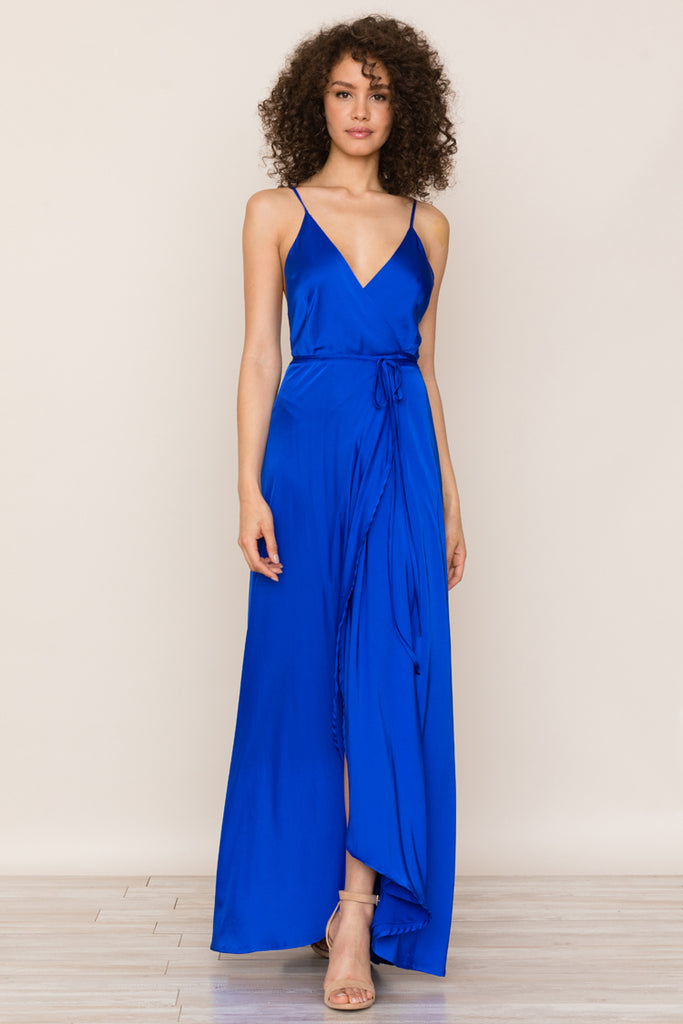 Our Rush Hour Royal Blue Satin Maxi Dress is your new go-to from weddings to running around the city. This elegant wedding guest dress includes a crossover bodice with deep v-neckline.