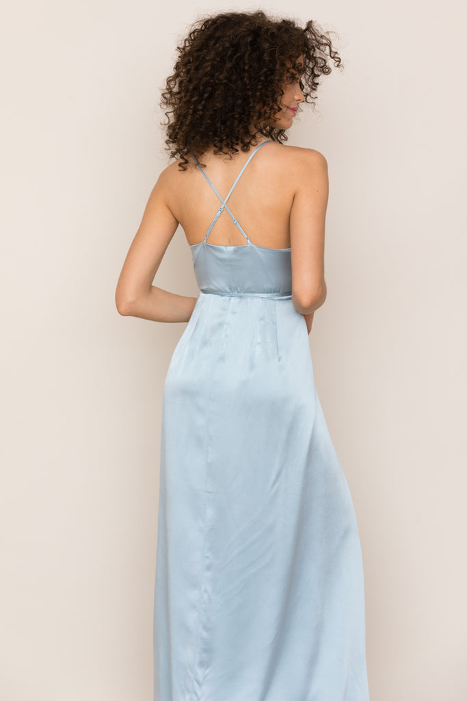 Yumi Kim's Rush Hour Blue Satin Maxi Dress is your new go-to from weddings to running around the city. This elegant wedding guest dress includes a crossover bodice with deep v-neckline.